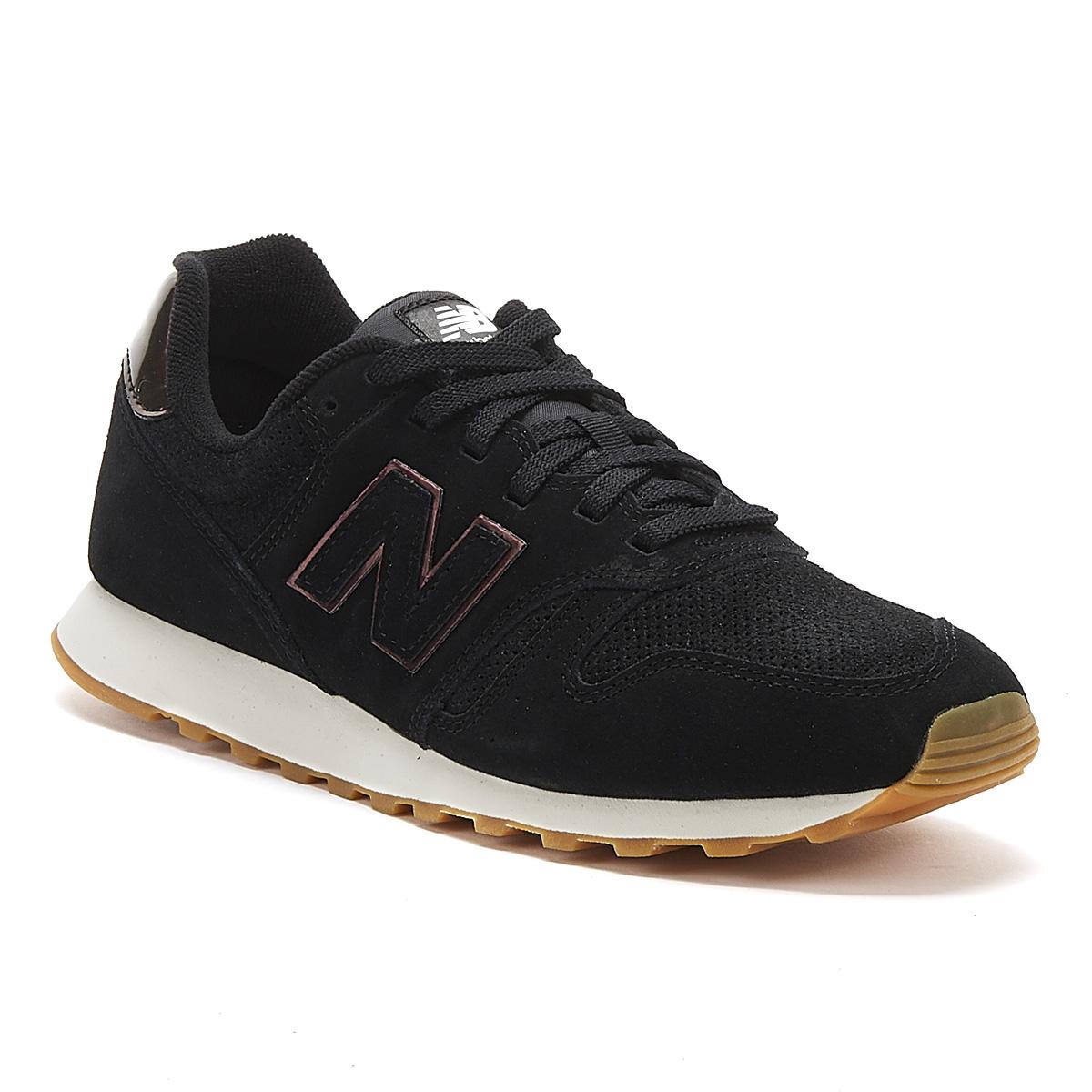 new balance black suede trainers