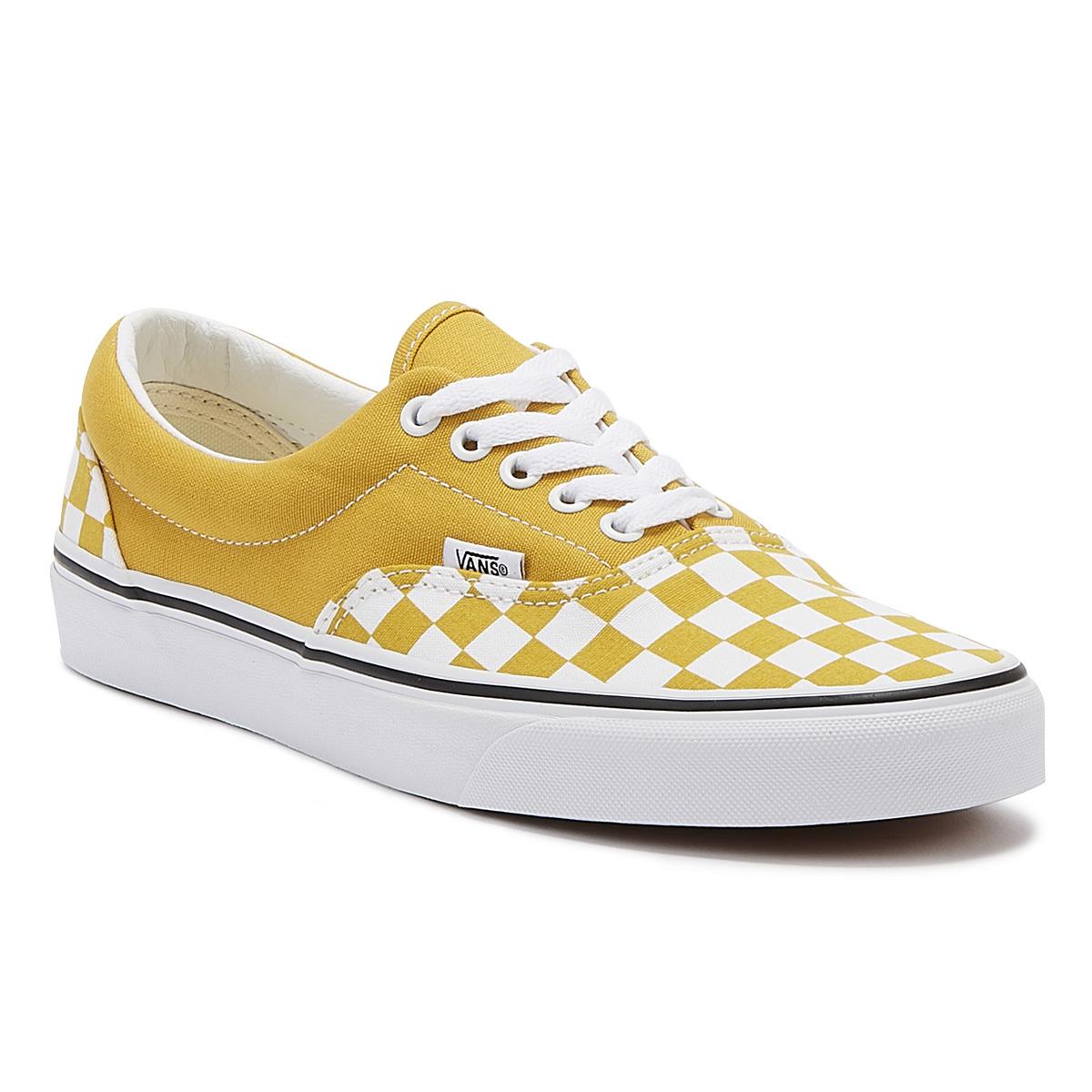black vans with yellow laces