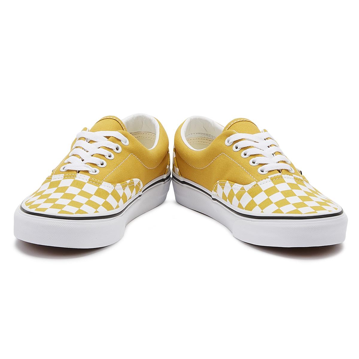 black vans with yellow laces