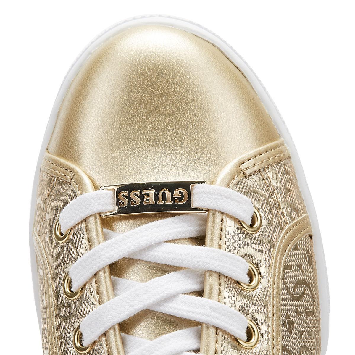 guess white and gold trainers