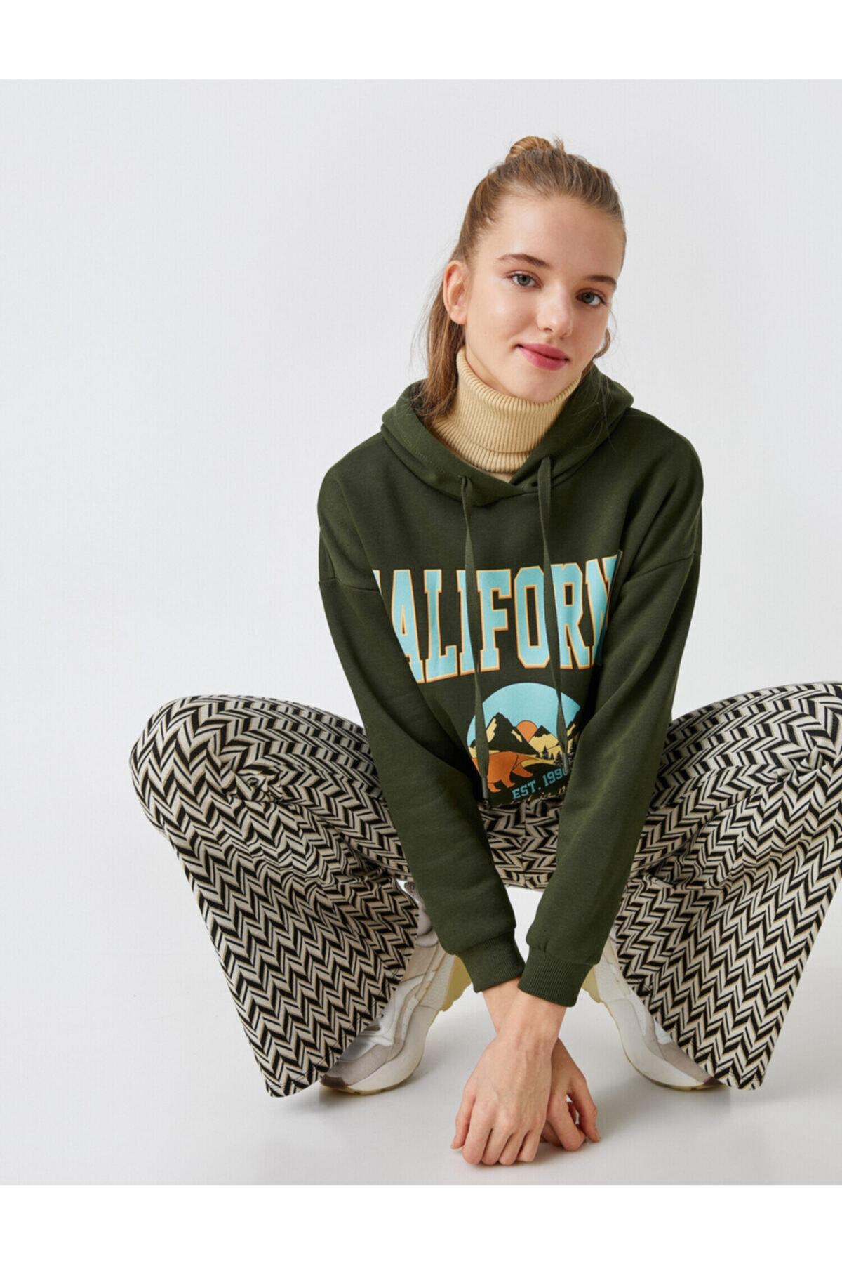 Koton Sweatshirt regular fit in Grün | Lyst DE