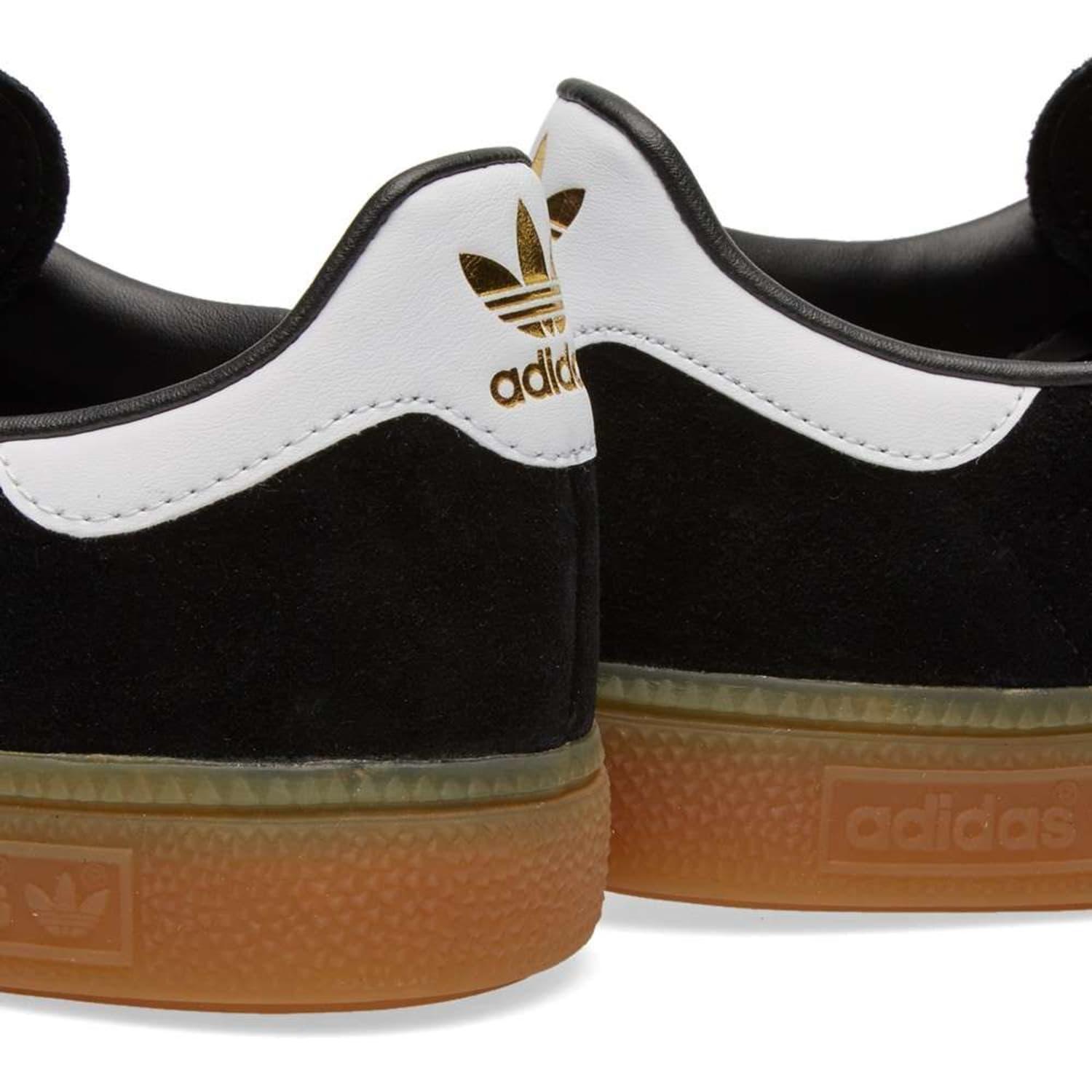 black metallic trainers