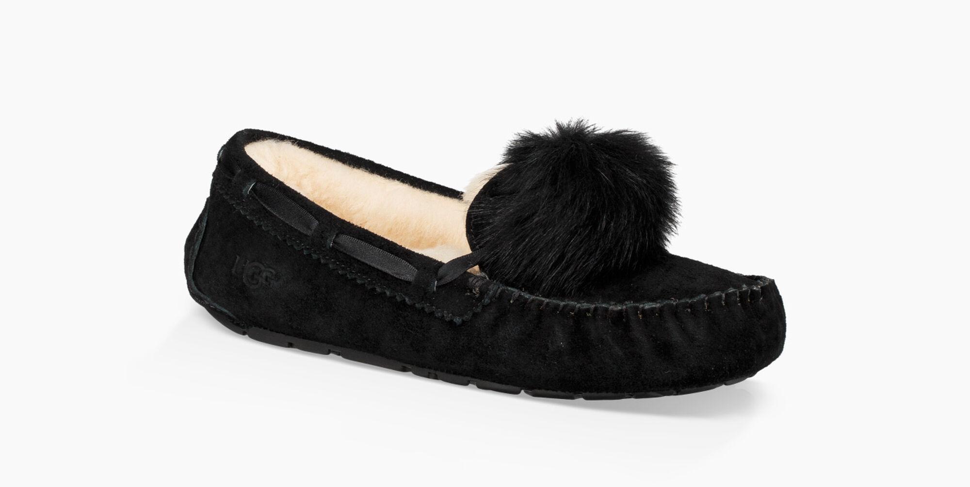 UGG Dakota Water Resistant Genuine Sheepskin Pompom Slipper in Black | Lyst