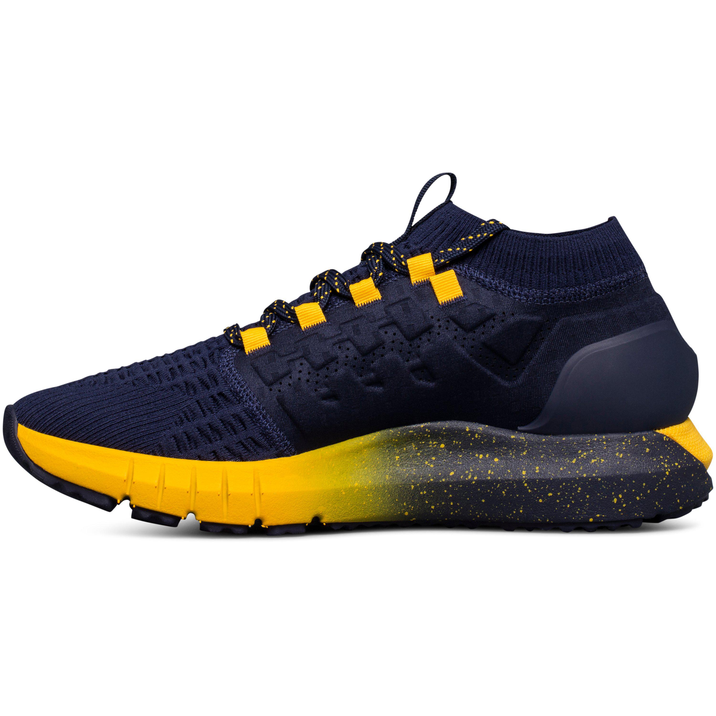 navy blue and gold under armour shoes