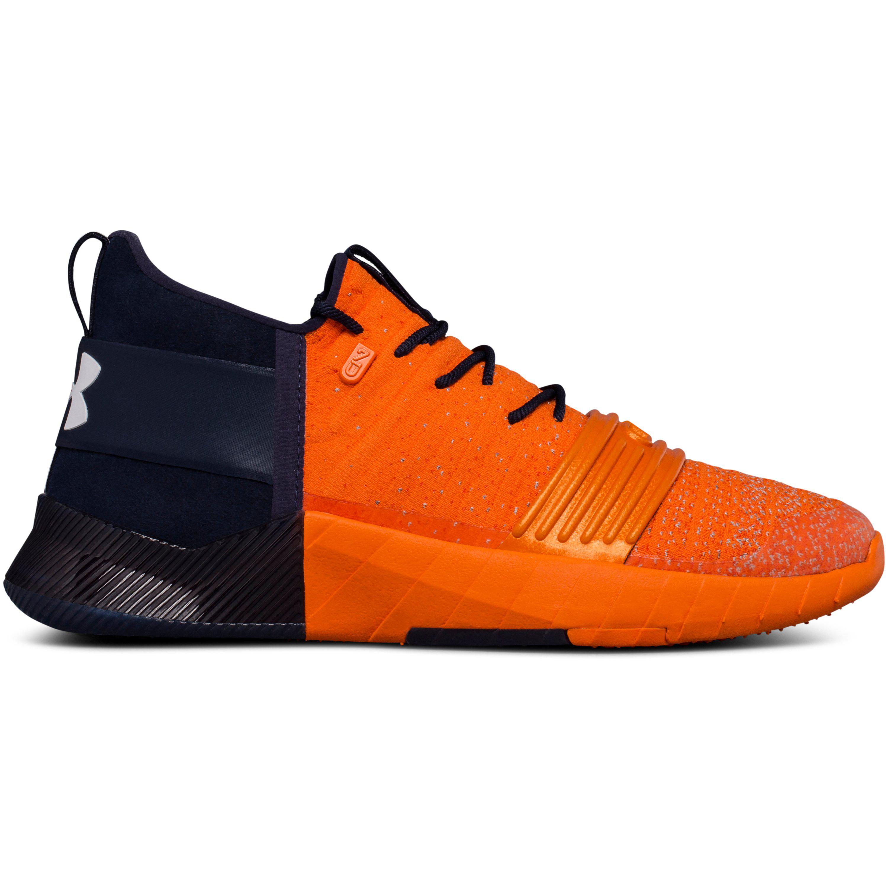 navy and orange under armour shoes