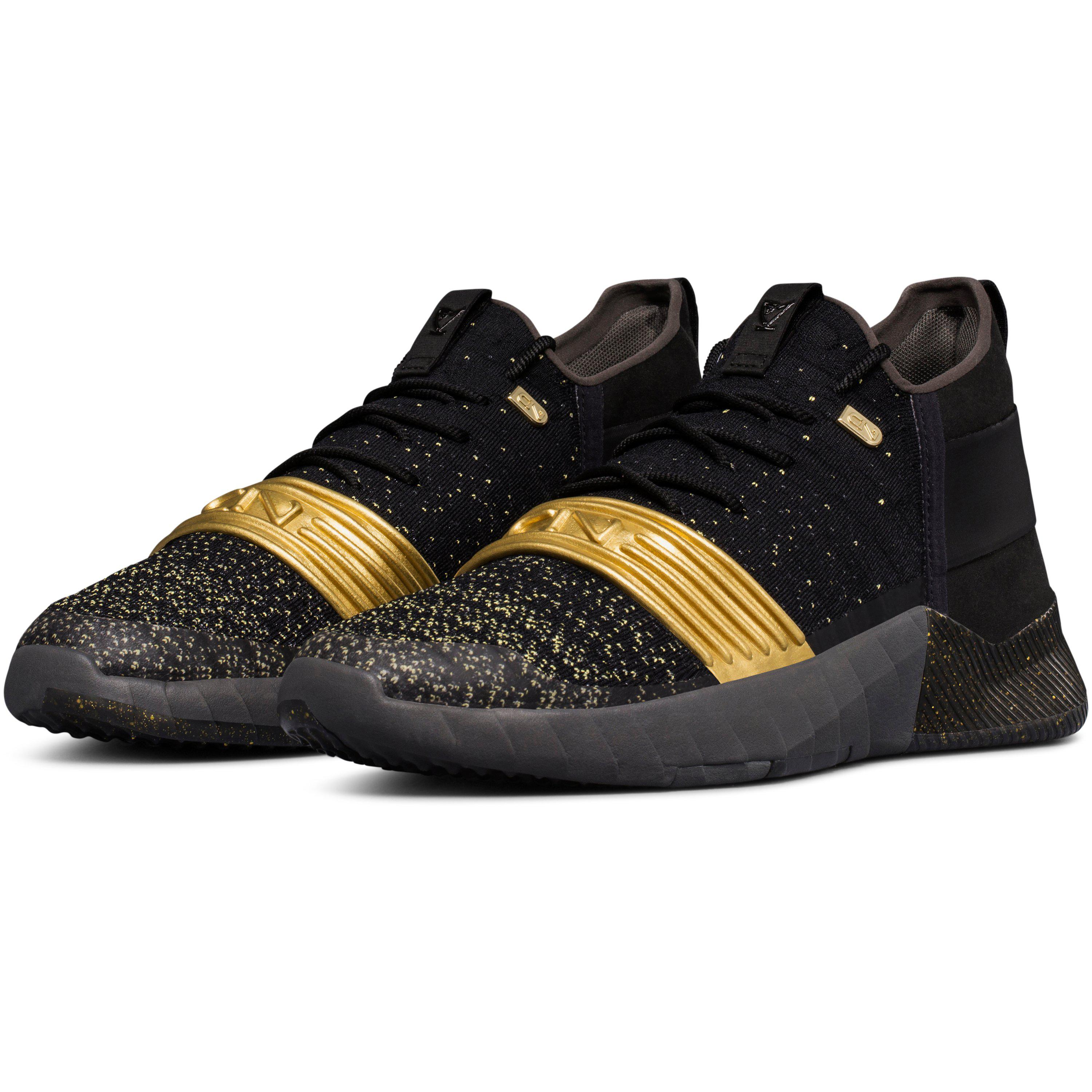under armour gold and black shoes