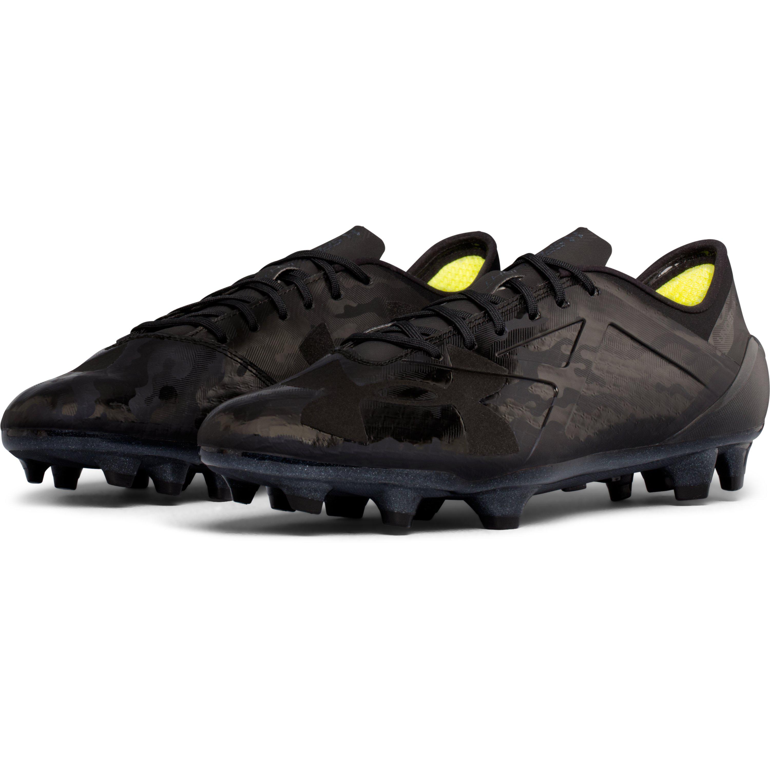 all black under armour spotlight cleats
