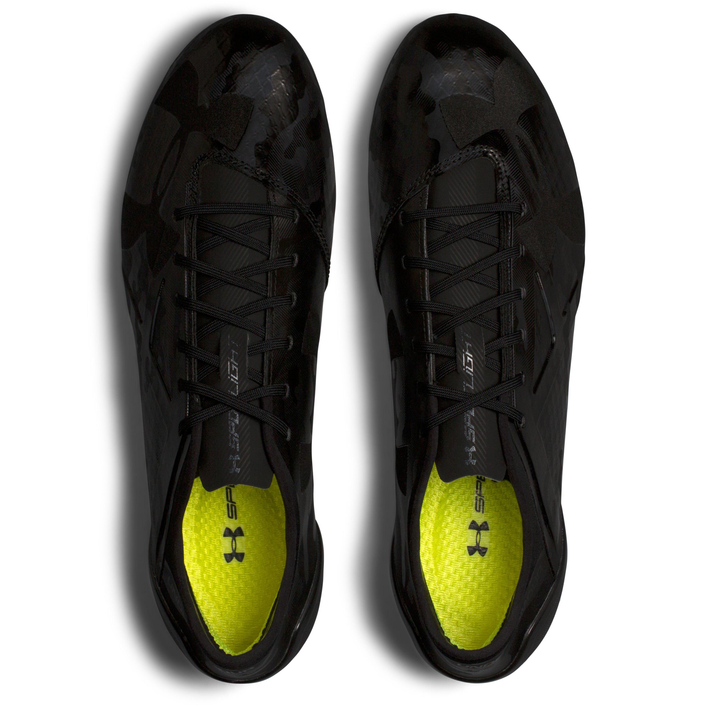 all black under armour spotlight cleats