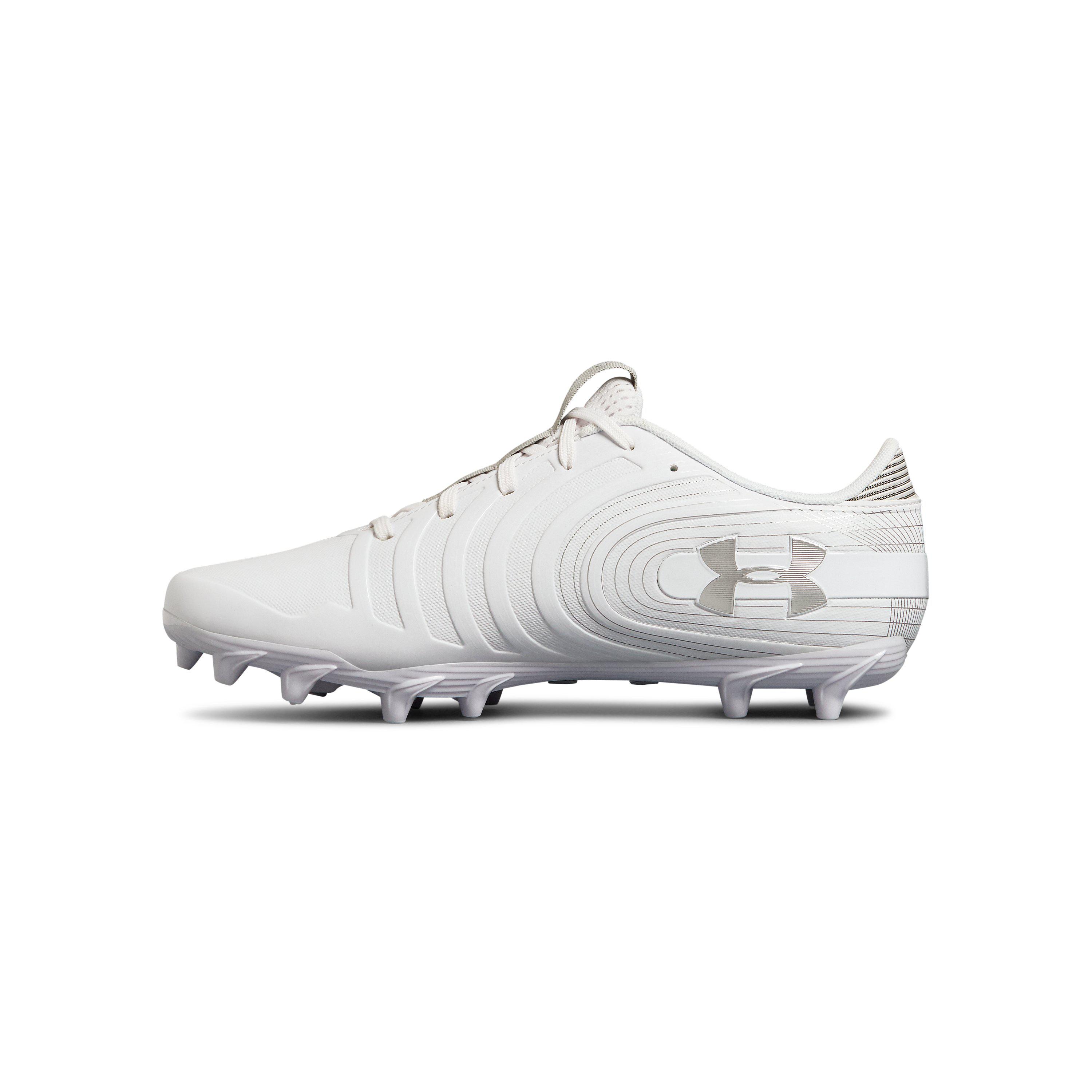 all white low top cleats
