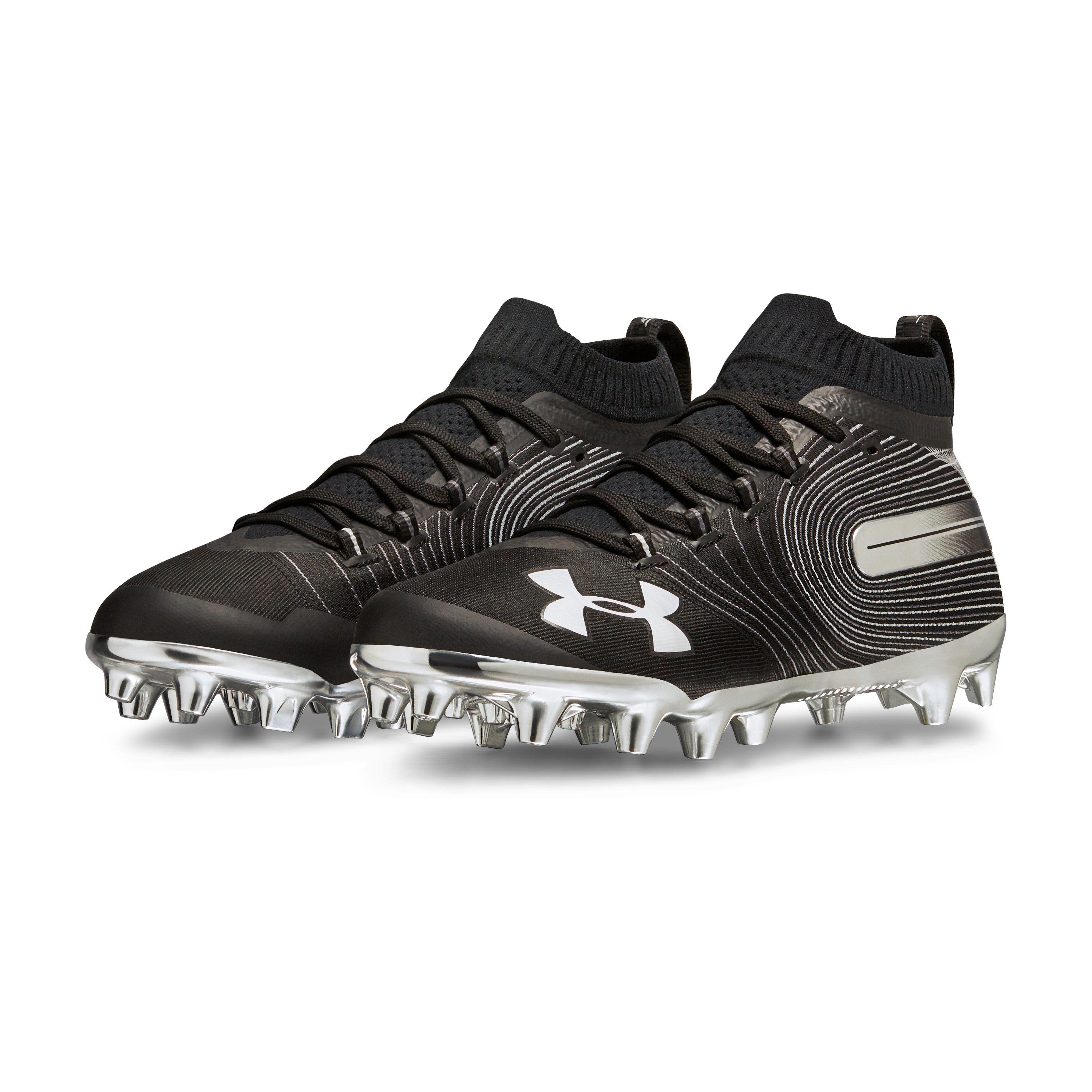 all black under armour spotlight cleats