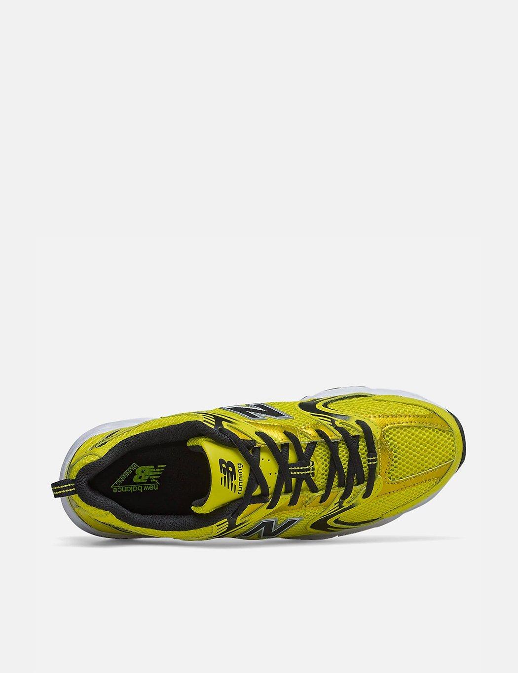 new balance 530 trainers in off white and yellow