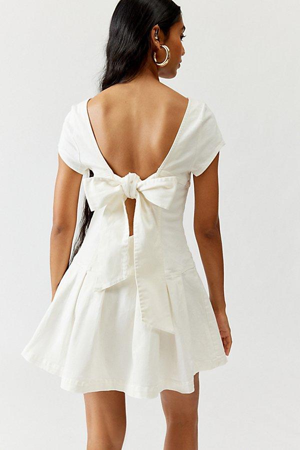 Urban Outfitters Uo Bryan Bow-Back Pleated Drop Waist Denim Mini Dress in  White | Lyst