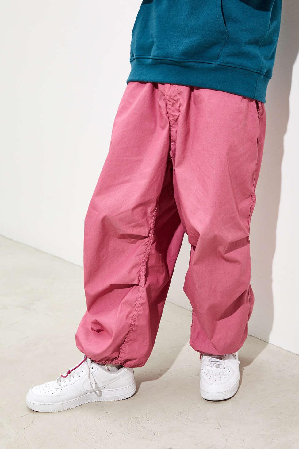 Urban Renewal Vintage Overdyed Baggy Wind Pant in Pink for Men