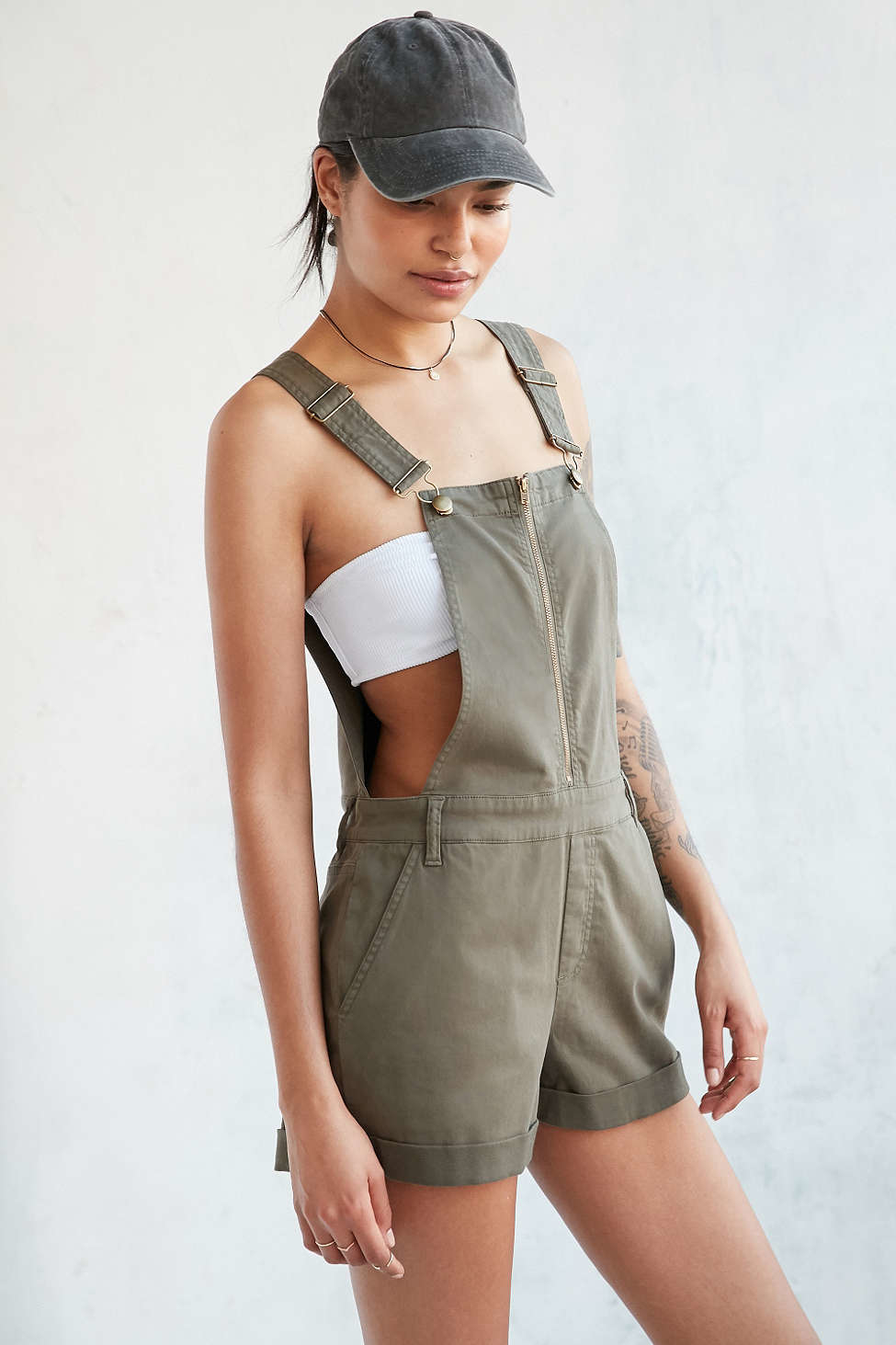 In a side-less construction with an apron front + racerback topped with thi...