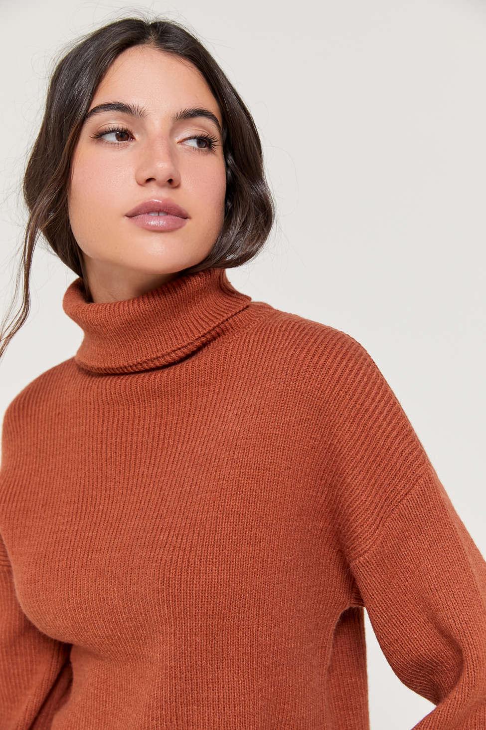 orange turtleneck outfit