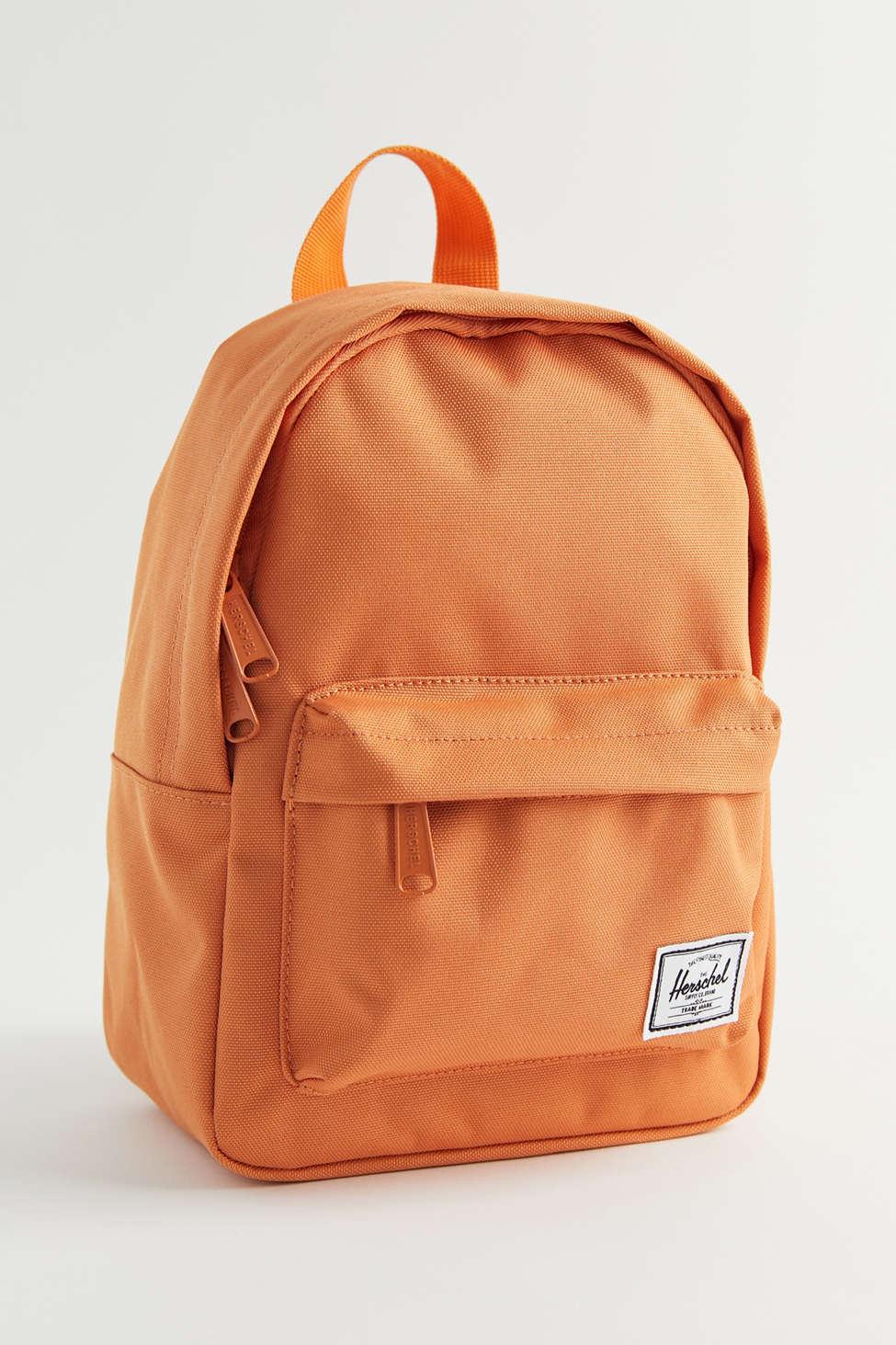 mini orange backpack