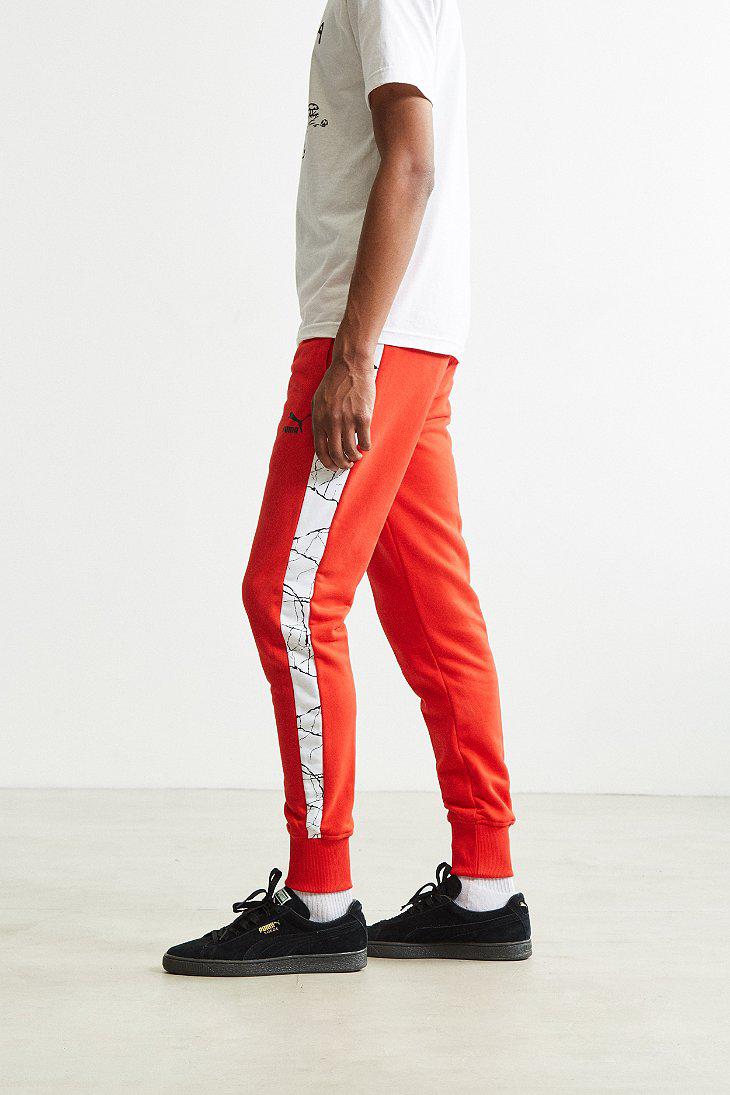 red puma track pants