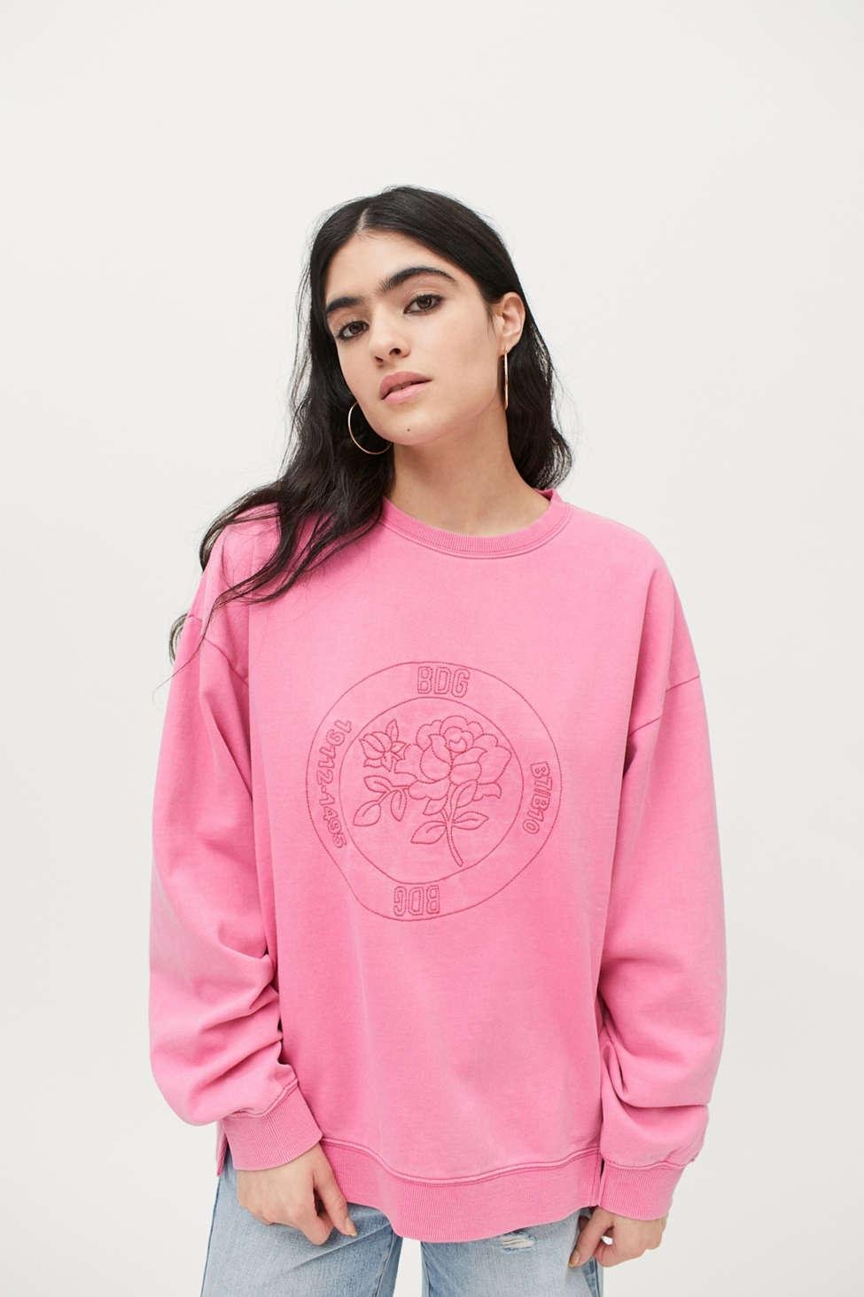 pink embroidered sweatshirt