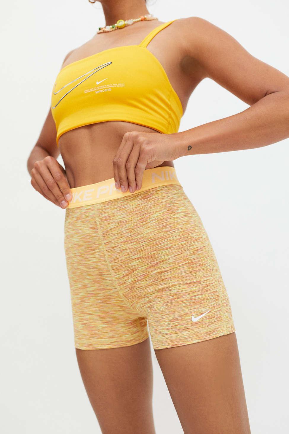 yellow nike pro shorts