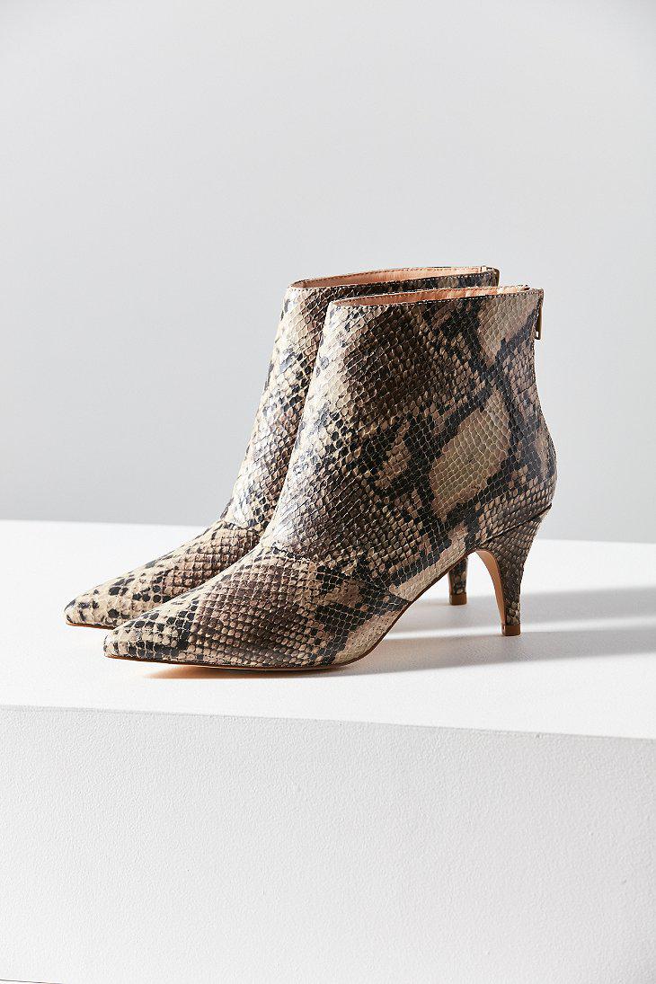snakeskin low heel booties