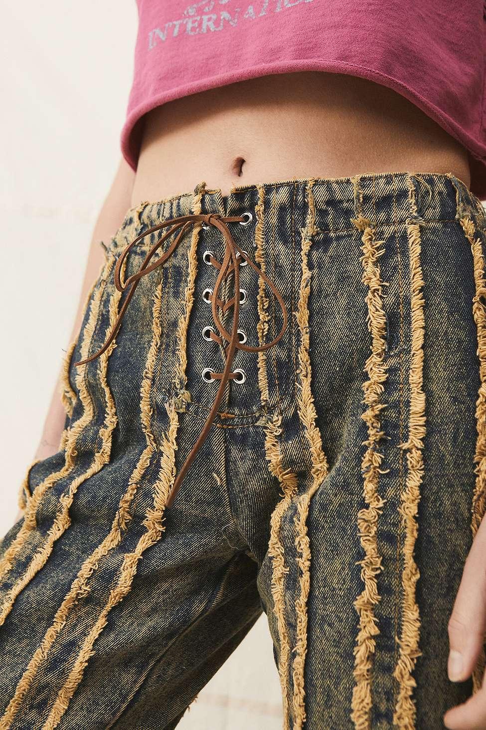 Distressed striped jeans sale