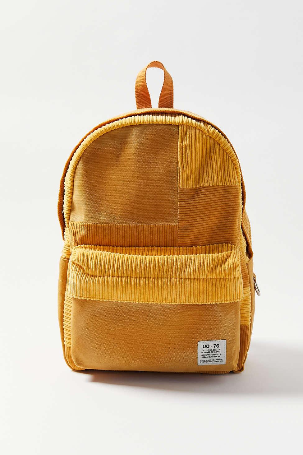 yellow corduroy backpack