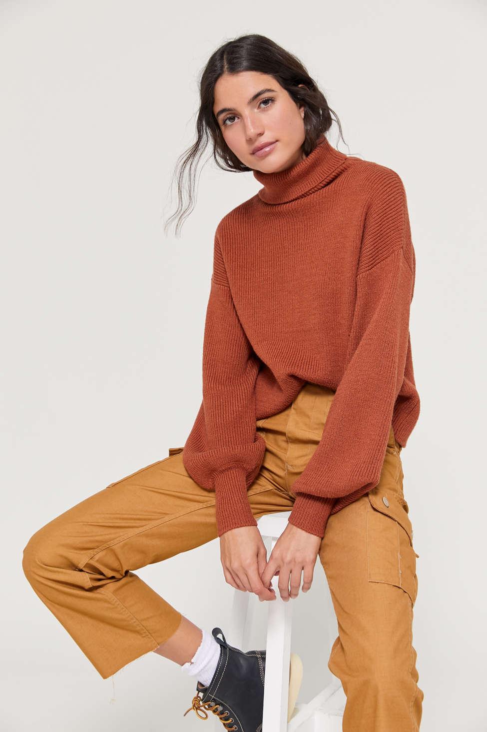 orange turtleneck outfit