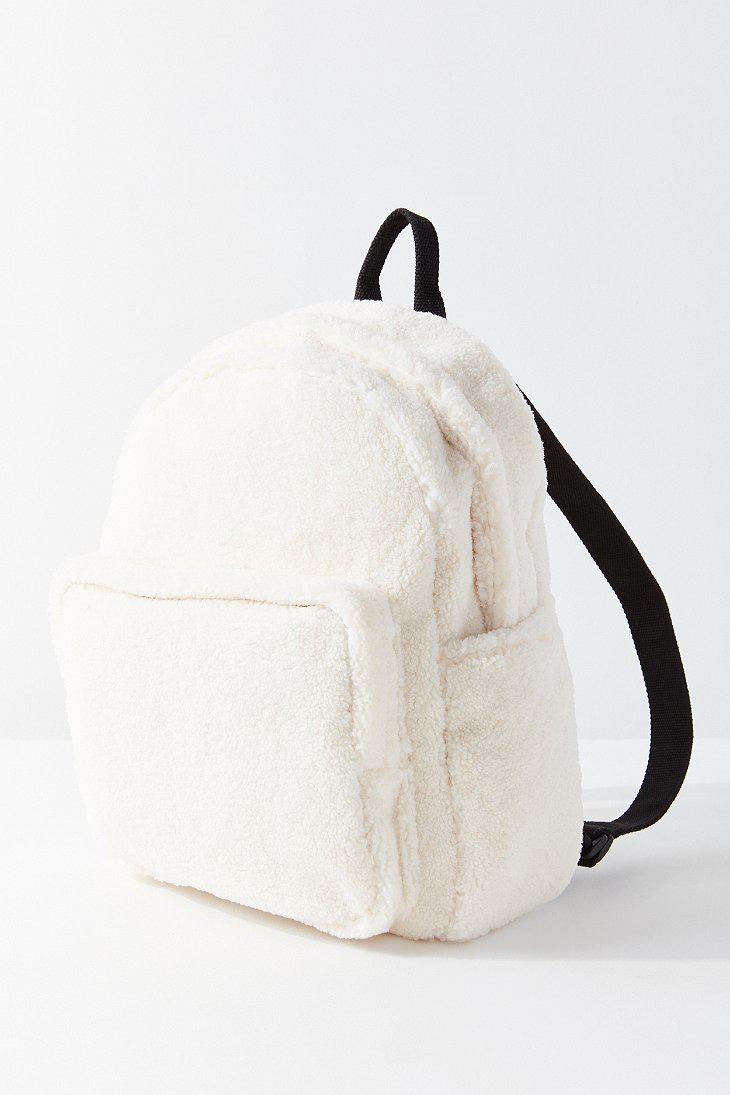 white fluffy backpack