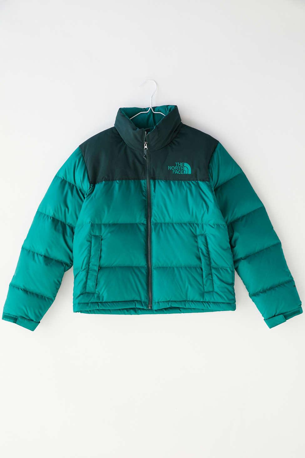 green north face puffer