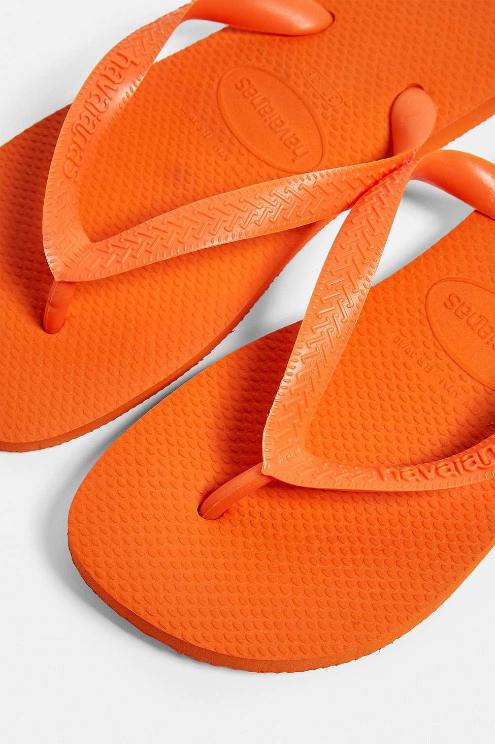 neon orange flip flops