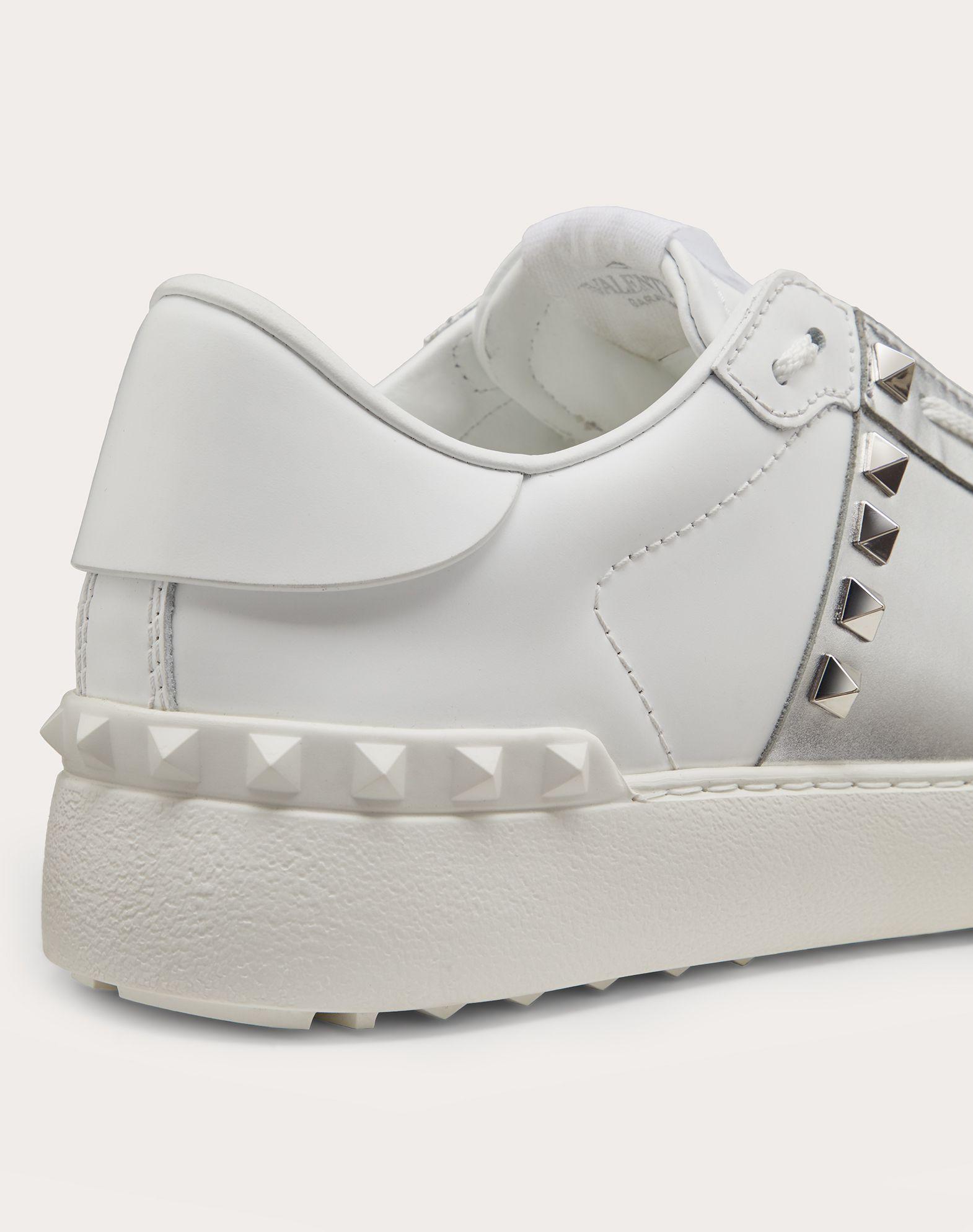 rockstud untitled sneaker in calfskin leather with metallic stripe