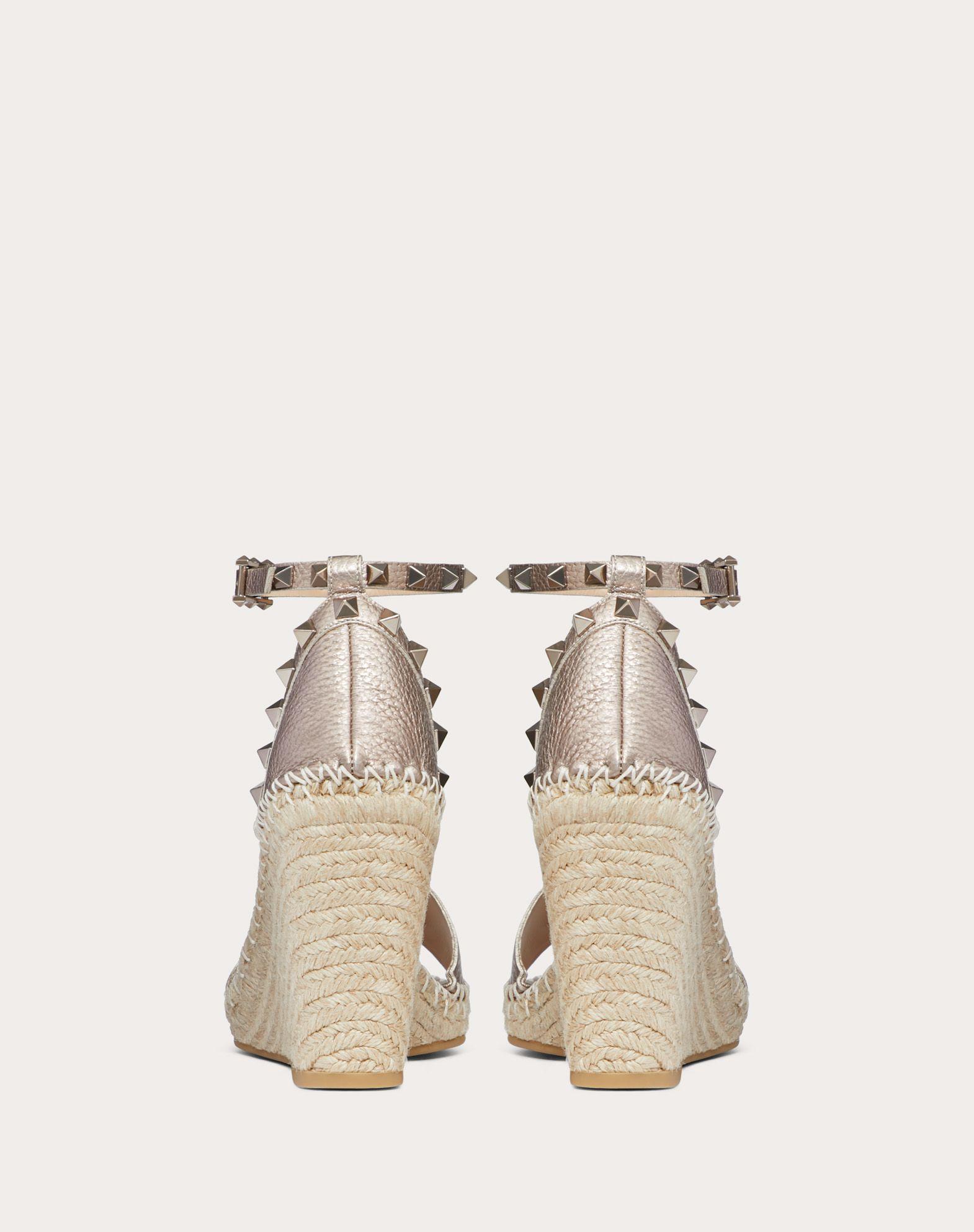 rockstud metallic grainy calfskin leather ankle strap pump 66 mm