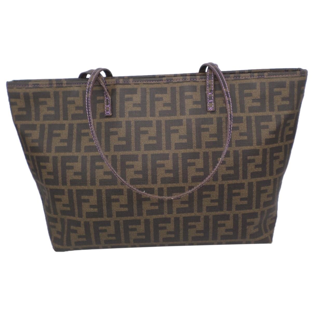 Lyst - Fendi Pre-owned Roll Bag Brown Cloth Handbags in Brown