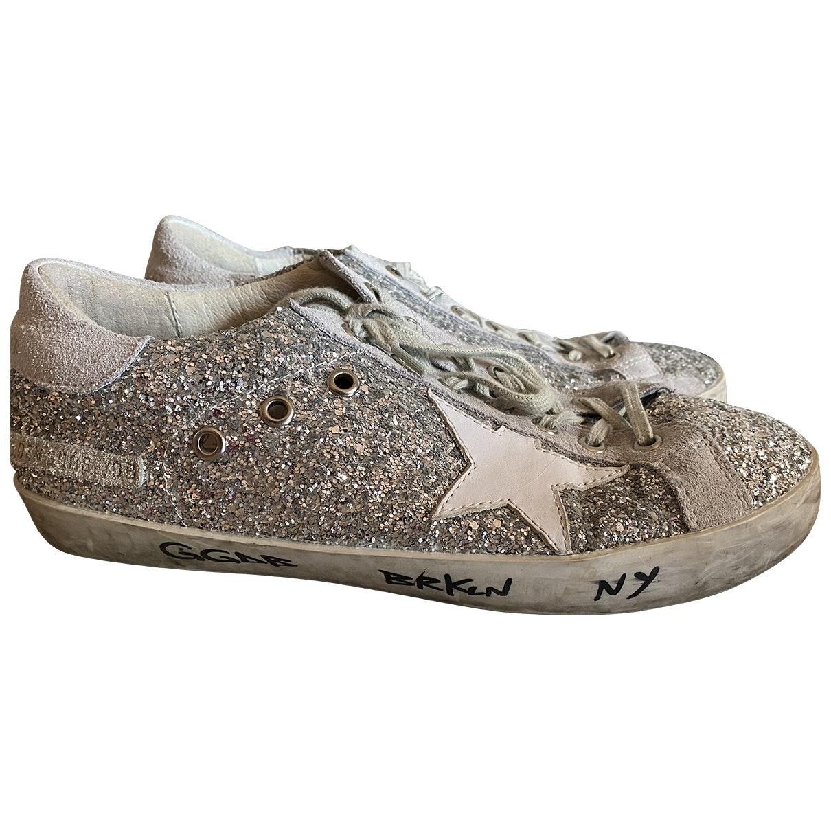 Golden Goose Deluxe Brand Goose Mid Star Glitter Trainers in Silver ...
