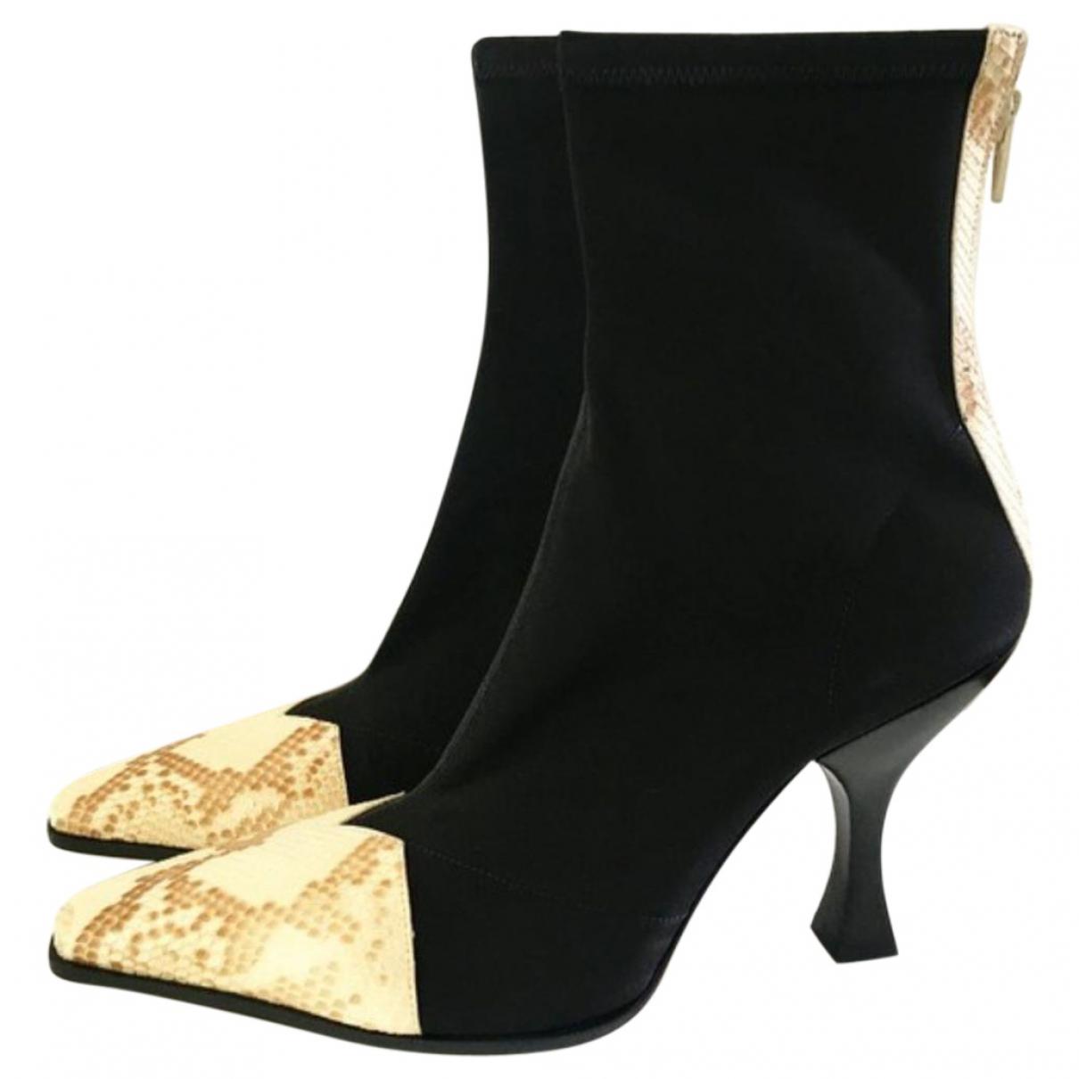 celine snakeskin boots