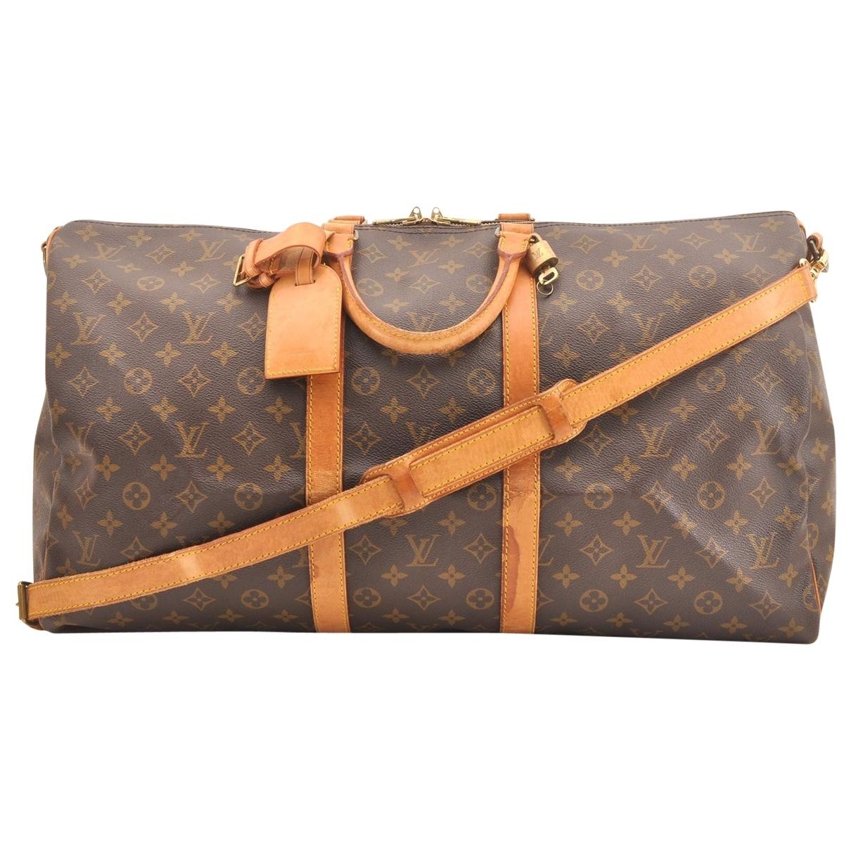 Lyst - Louis Vuitton Vintage Keepall Brown Cloth Travel Bag in Brown