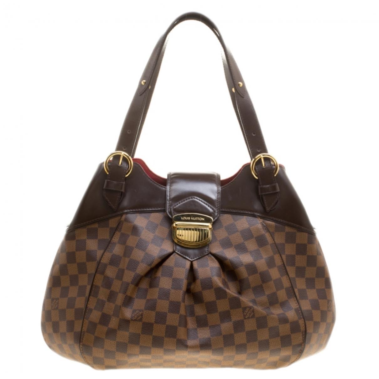 Louis Vuitton Brown Leather Handbag - Lyst