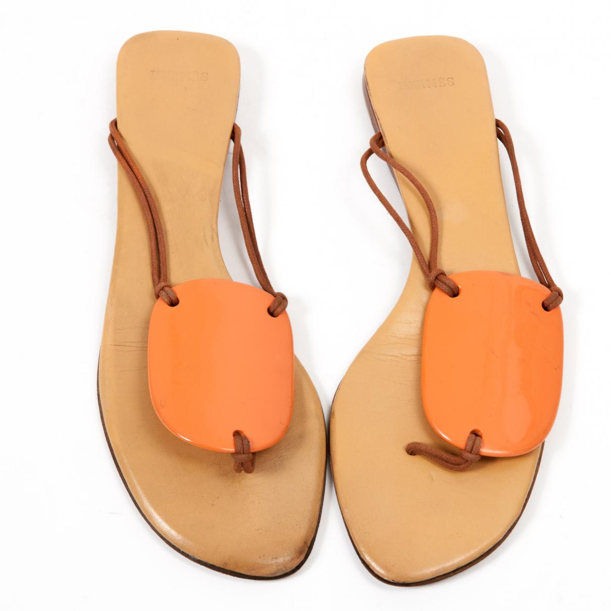 HermÃ¨s Pre-owned Leather Flip Flops in Orange - Lyst