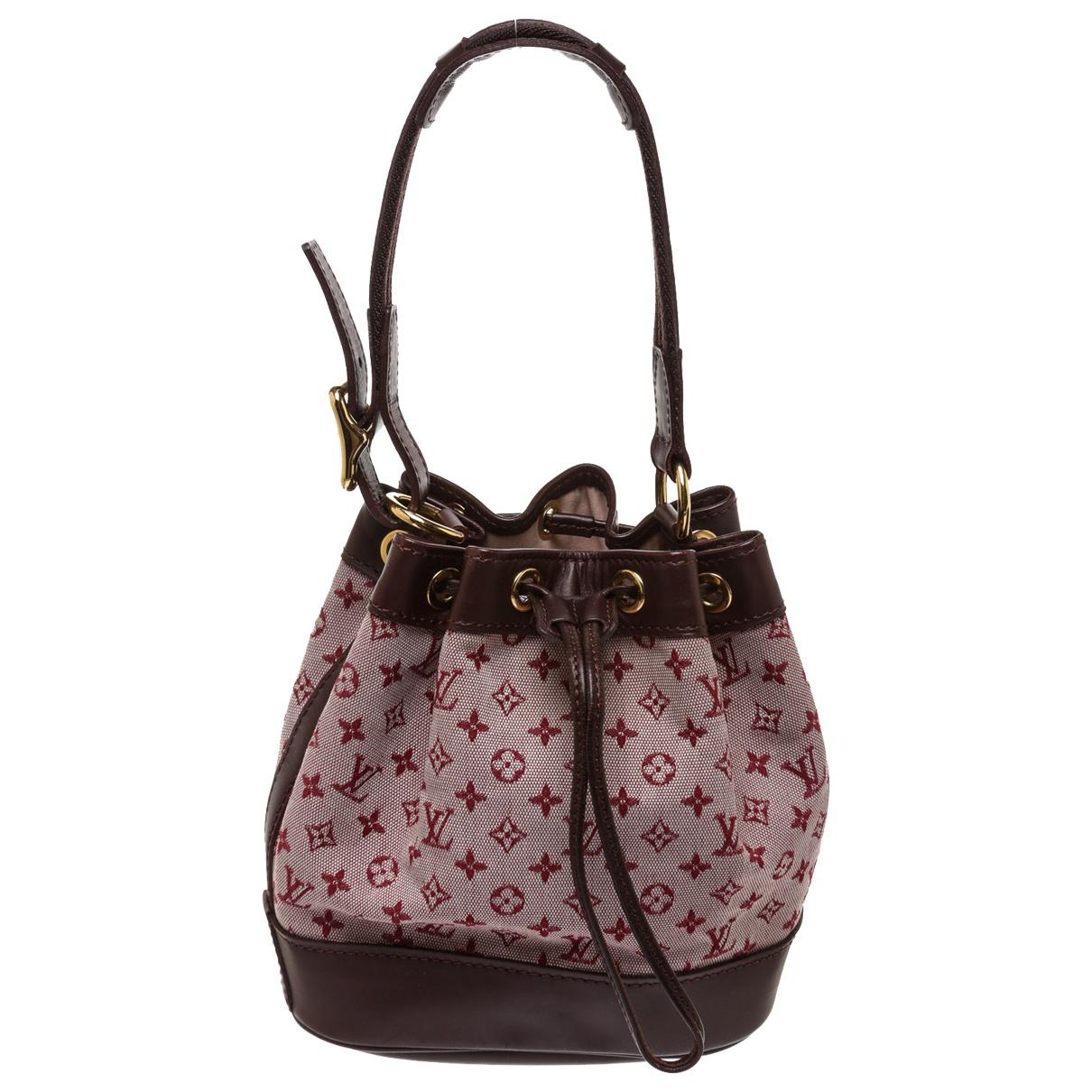 Louis vuitton Pre-owned Bucket Cloth Handbag in Red | Lyst