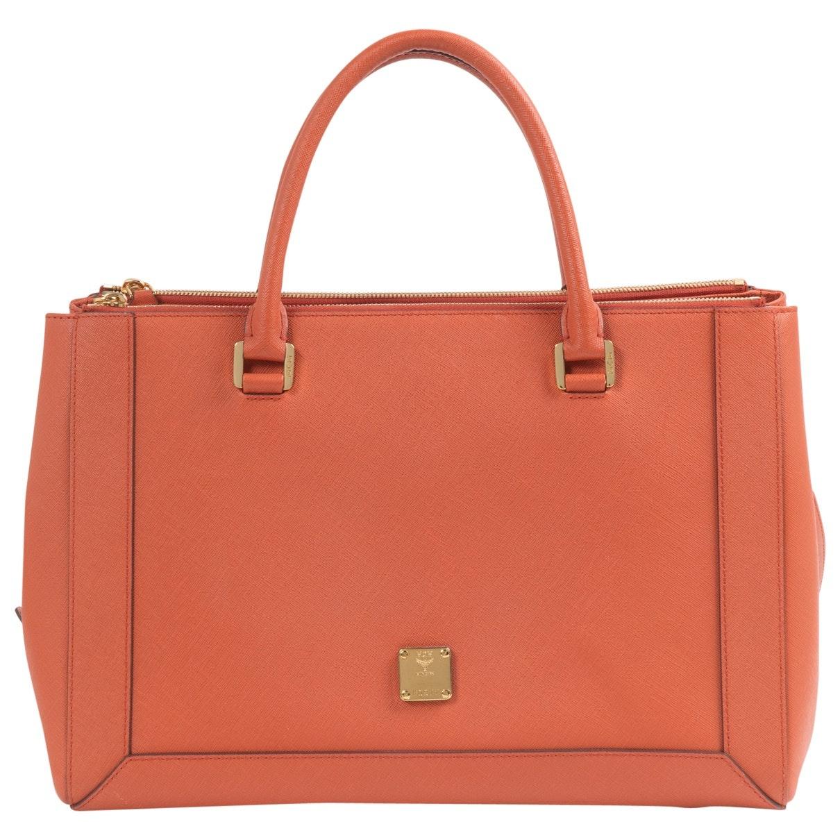 MCM Orange Leather Handbag Lyst