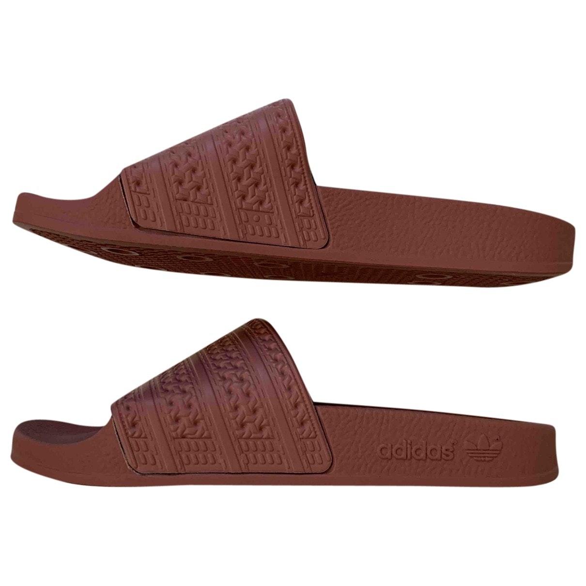 adidas Rubber Adilette Flip Flops in Brown - Lyst