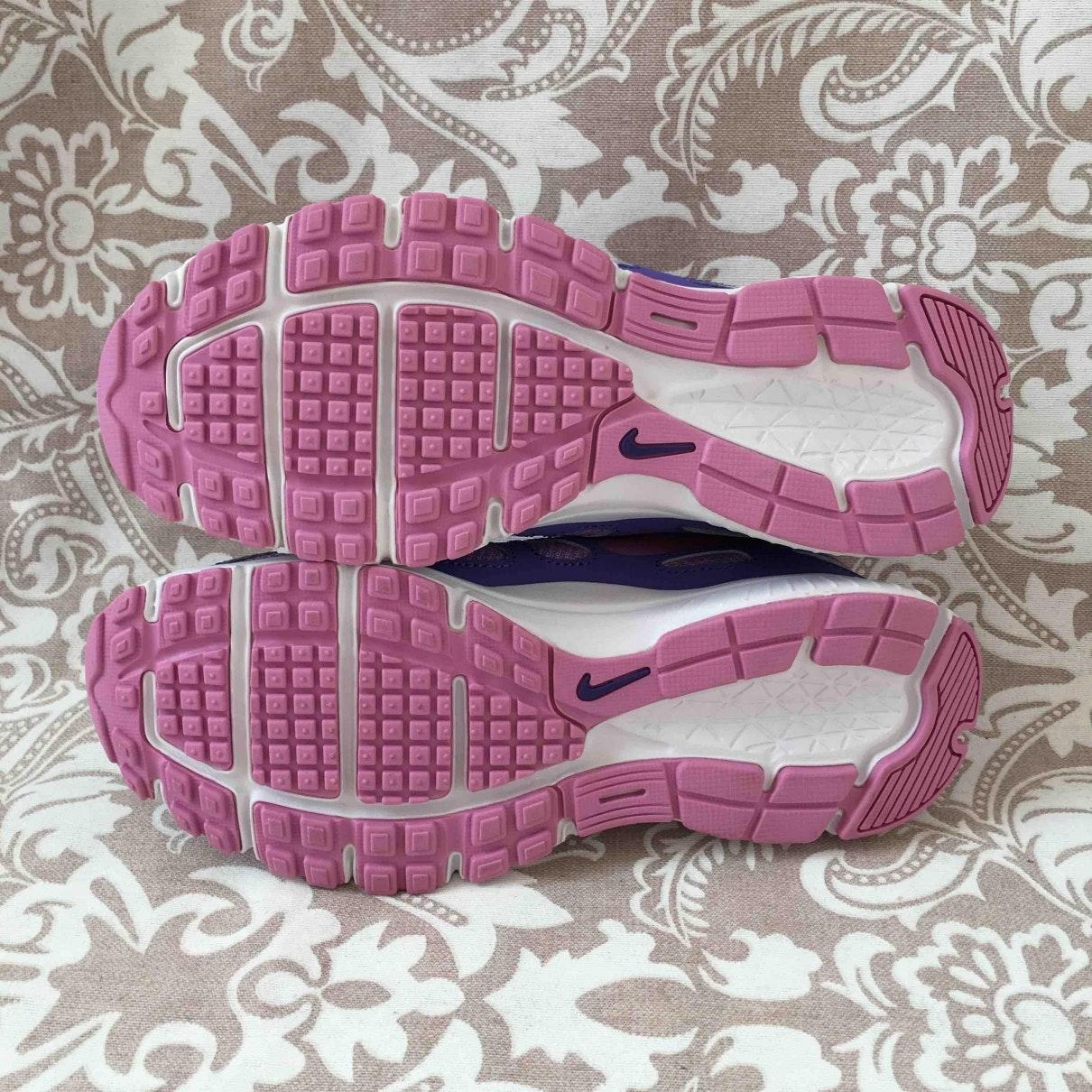 black and purple nike trainers