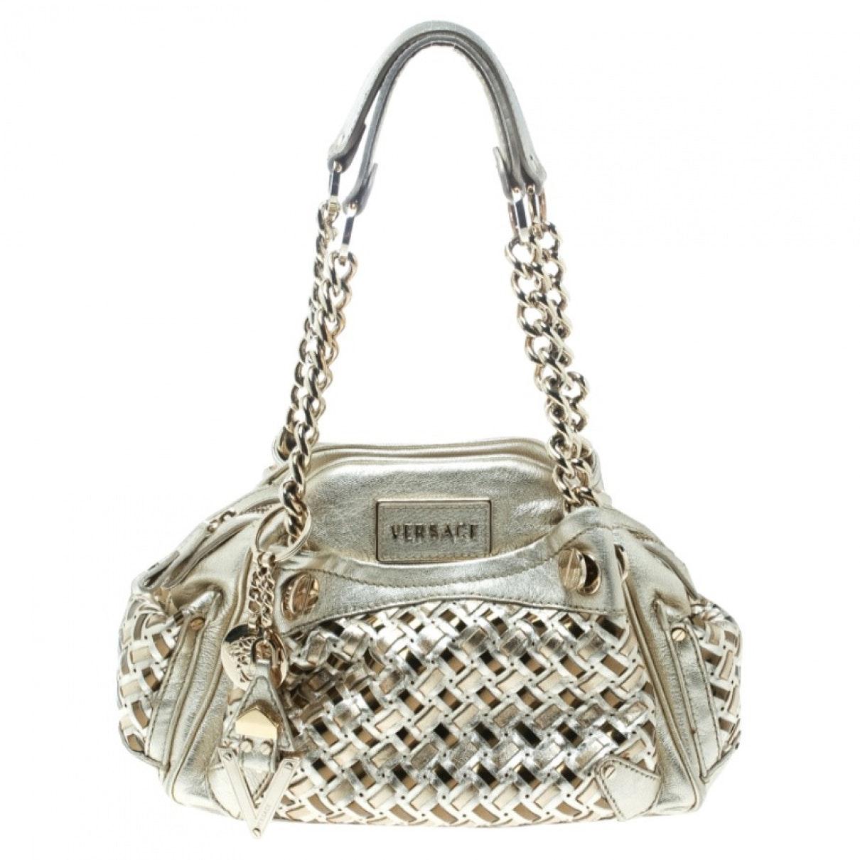 Versace Gold Leather Handbag in Metallic Lyst