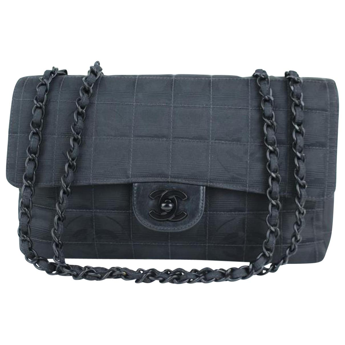 Chanel Pre-owned Timeless Cloth Handbag in Black - Lyst