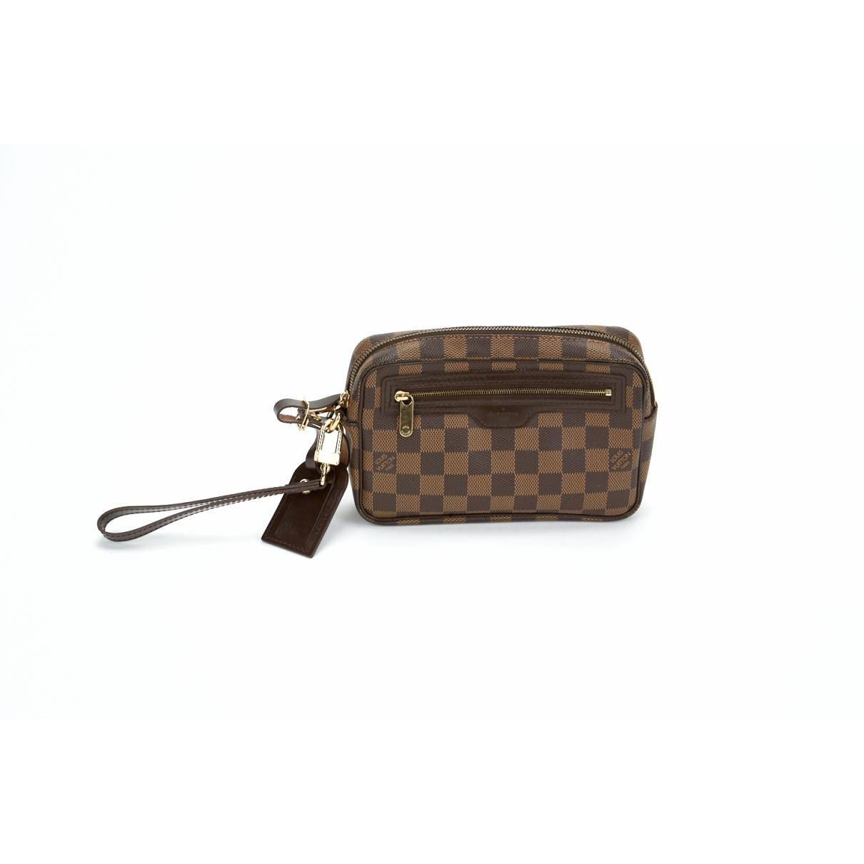 Louis Vuitton Canvas Pre-owned Clutch in Brown - Lyst