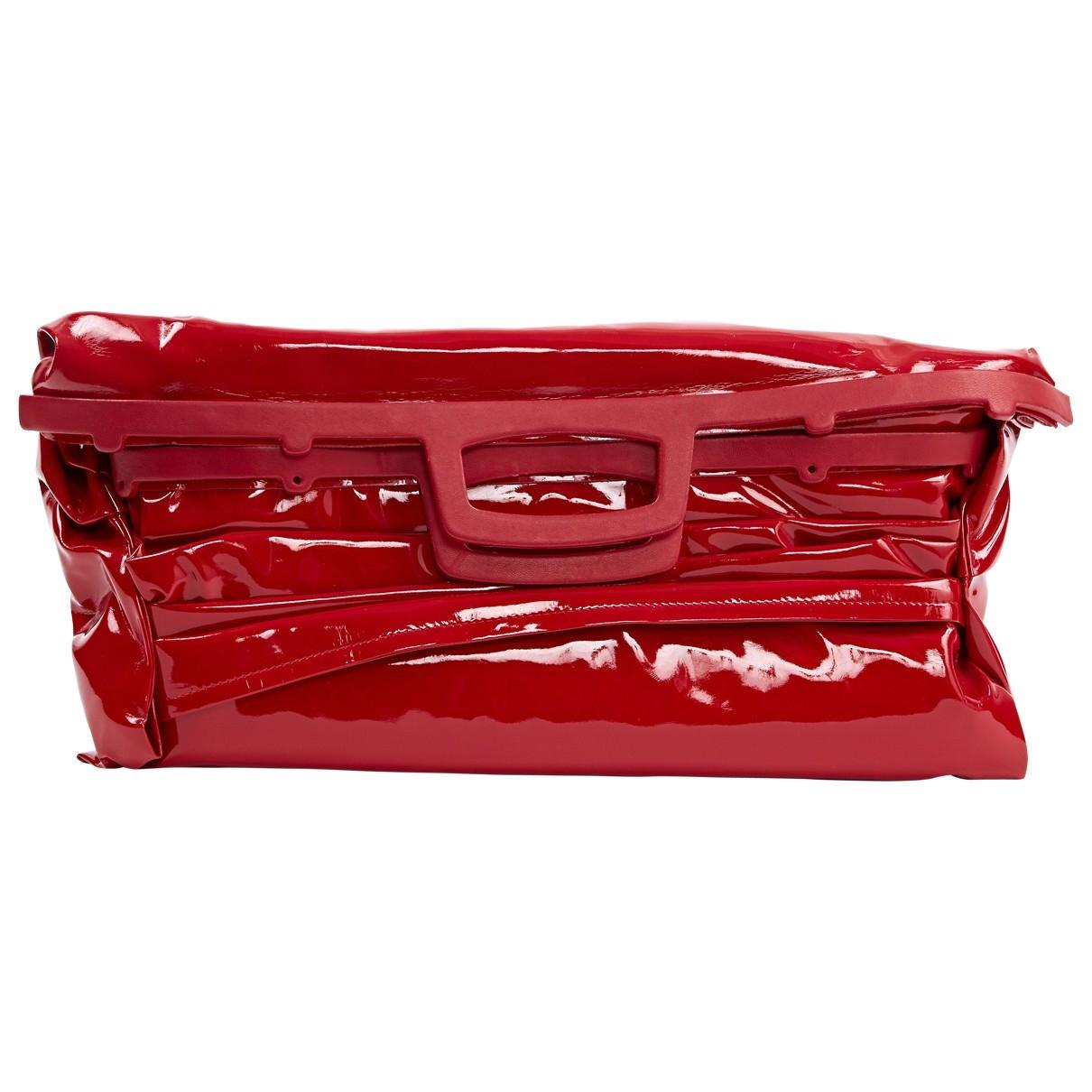 red patent leather clutch