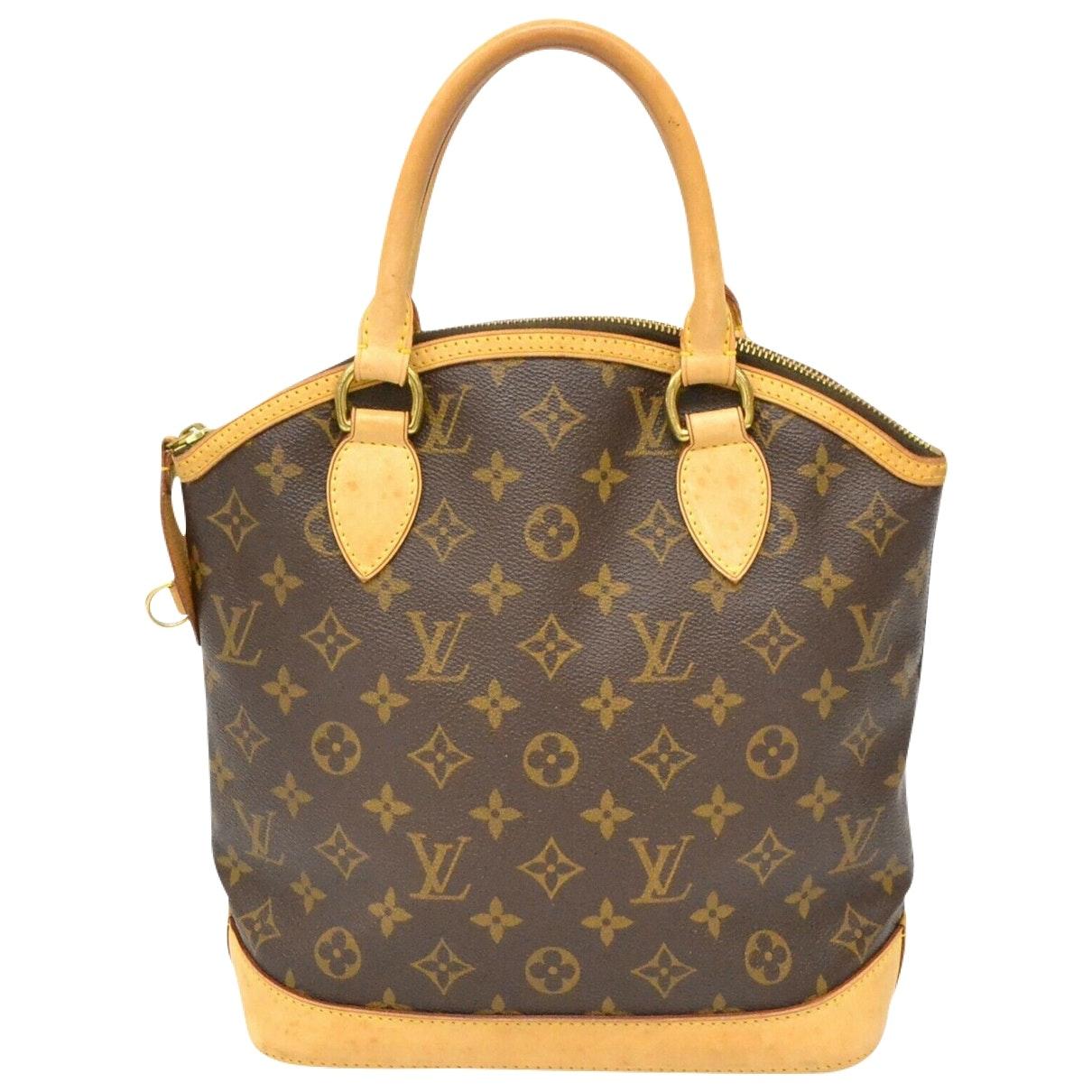 Louis Vuitton Lockit Vertical Cloth Handbag in Brown - Lyst