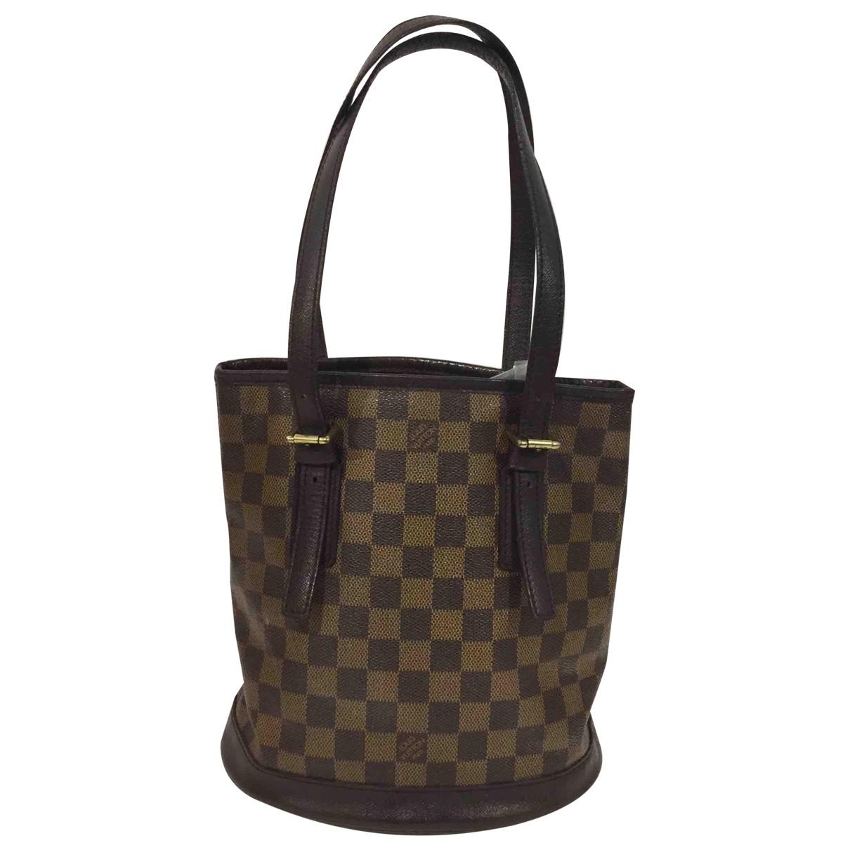 Louis Vuitton Pre-owned Brown Cloth Handbags in Brown - Lyst