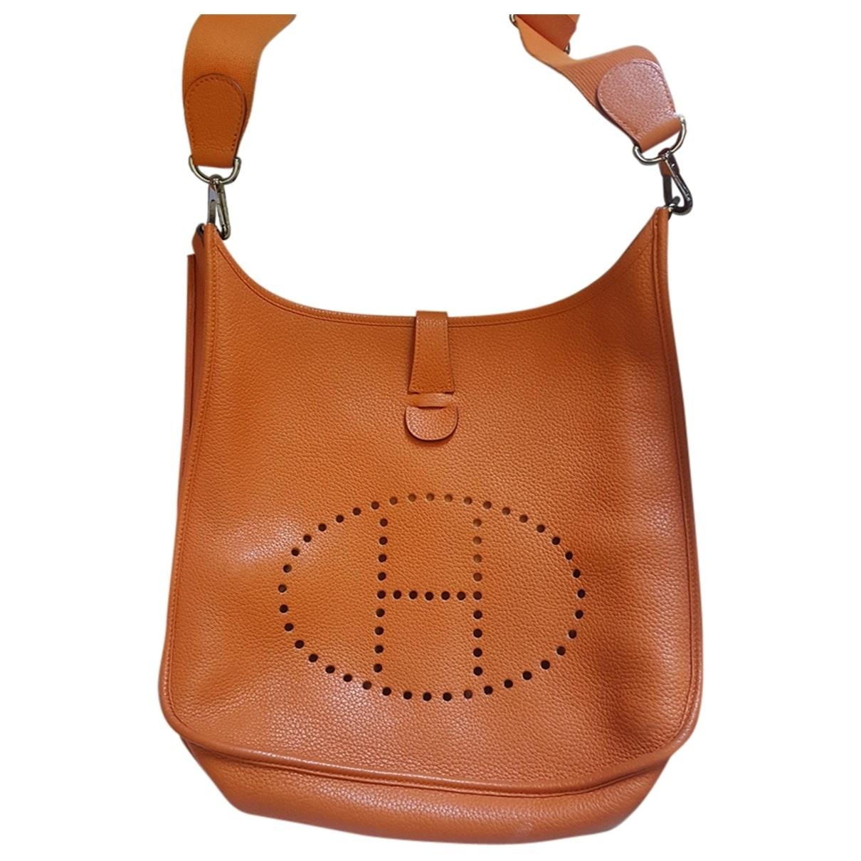 Hermès Evelyne Leather Crossbody Bag in Orange - Lyst