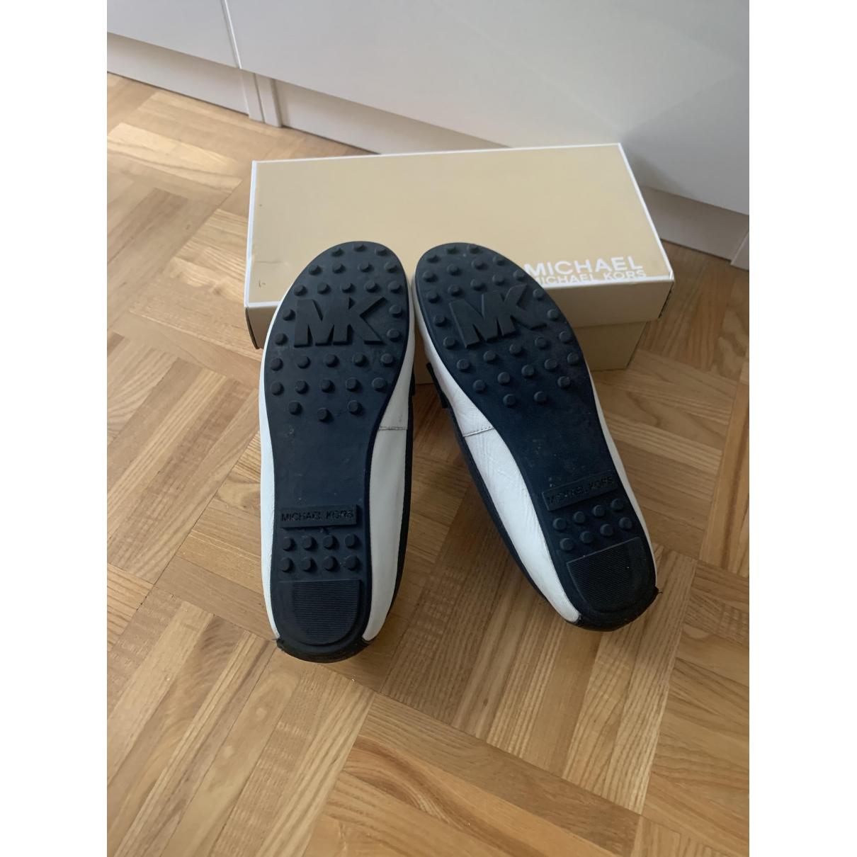 mk white flats